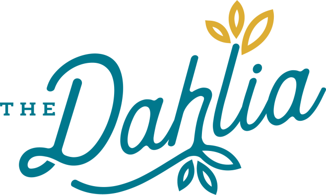 the dahlia logo with leaves and flowers at The 